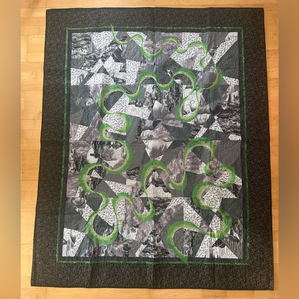 Handmade Quilt " ELEPHANT TRACKS". Measures ~ 56 inches x 69.5